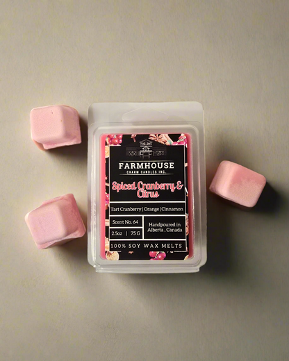 Bring the spirit of the festive season into your home with the irresistible scent of Spiced Cranberry &amp; Citrus Soy Wax Melts. This delightful blend of tart cranberry, zesty orange, and warm cinnamon creates an inviting atmosphere perfect for holiday gatherings or quiet winter nights.