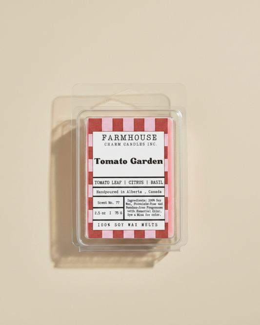 Packaged wax melt with 'Farmhouse Charm Candles Inc' Tomato Garden label on a beige background