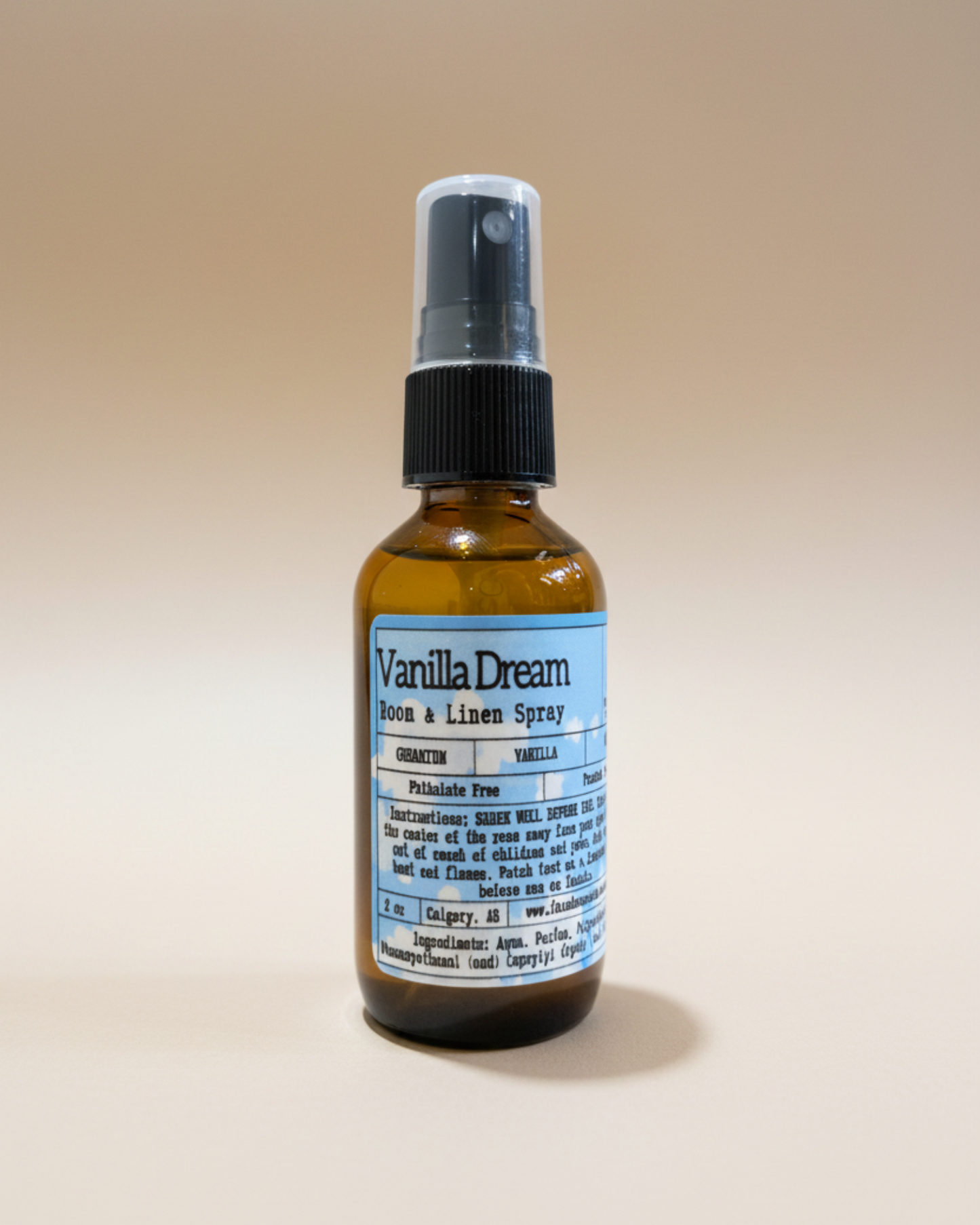 Bottle of Vanilla Dream room & Linen spray by Farmhouse Charm Candles on a beige background