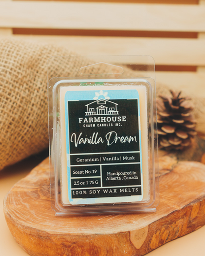 Farmhouse Candle Co. vanilla dream wax melt packaging on a wooden surface with a rustic background.