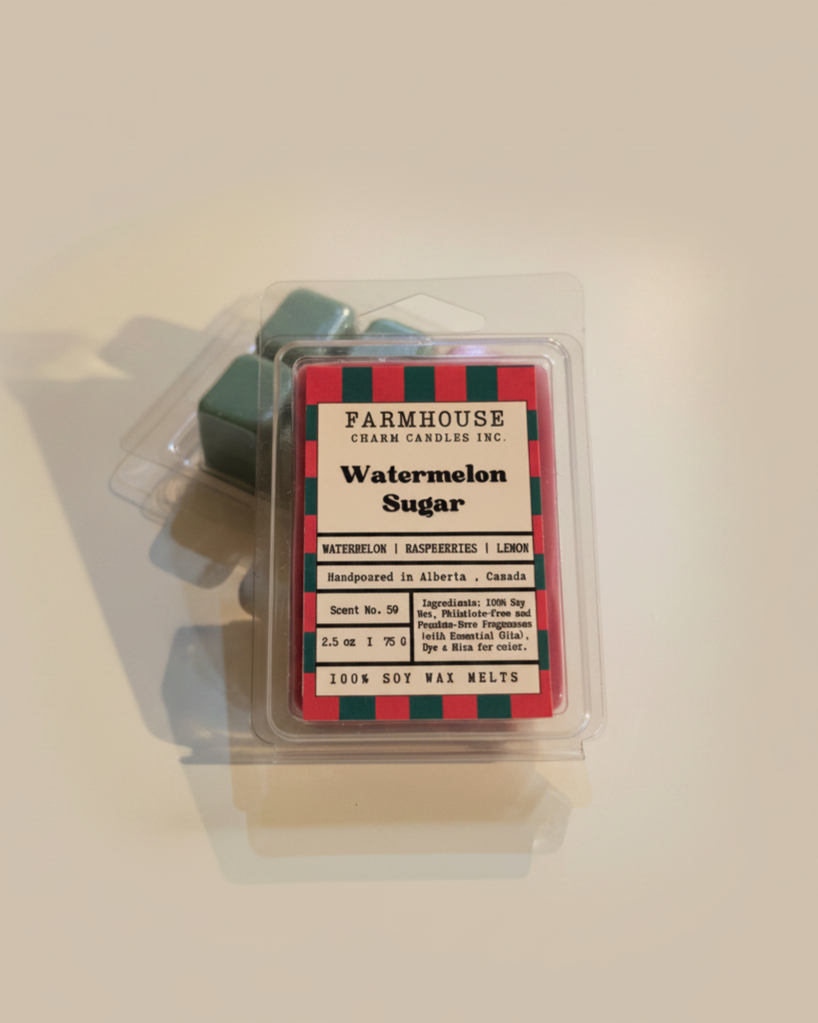 Farmhouse Charm Candles Inc watermelon sugar wax melt packaging on a white surface