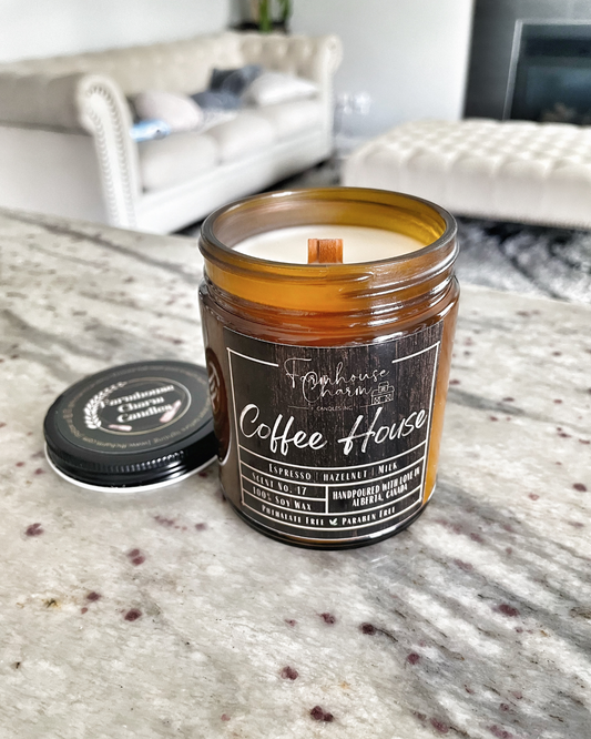 If you're someone who enjoys the scent of coffee in the morning, the Coffee House - Farmhouse Charm Soy Candle is definitely one to try. This candle boasts a rich, medium dark roast scent with subtle hints of caramel and vanilla. This candle is not only great for waking up your senses, but it's also perfect for creating a cozy and inviting atmosphere in your home. www.farmhousecharmcandles.com