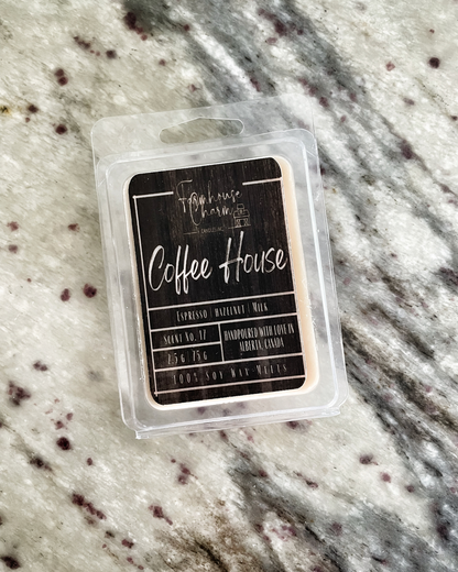 If you're someone who enjoys the scent of coffee in the morning, the Coffee House Soy Wax Melts - Farmhouse Charm is definitely one to try. This wax melts boasts a rich, medium dark roast scent with subtle hints of caramel and vanilla. The fragrance is not only great for waking up your senses, but it's also perfect for creating a cozy and inviting atmosphere in your home.  Coffee House Soy Wax Melts - Farmhouse Charm is made with 100% natural soy wax. www.farmhousecharmcandles.com