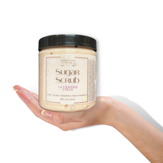 Farmhouse Charm Sugar Scrub- Lavender Field is a skincare product made with natural & plant-based ingredients, such as Sugar | Avocado Oil | Cocoa Butter | Essential Oils | Vitamin E Oil that is used to exfoliate and moisturize the skin. It helps to remove dead skin cells and promote healthy, glowing skin. It does not contain any artificial colorants and fragrance.