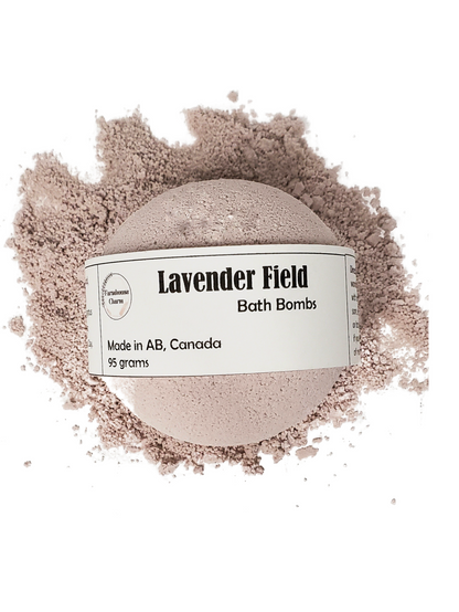 Lavender Field Bath Bomb- Farmhouse Charm is made with all natural ingredients and infused with essential oils. Drop or hold in bath water. Enjoy the fizzing action, wonderful aromas and nourishing oils.
