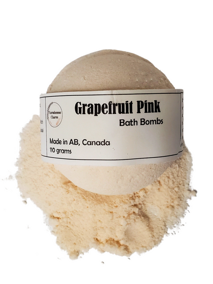 Grapefruit Pink Bath Bomb- Farmhouse Charm is made with all natural ingredients and infused with essential oils. Drop or hold in bath water. Enjoy the fizzing action, wonderful aromas and nourishing oils.
