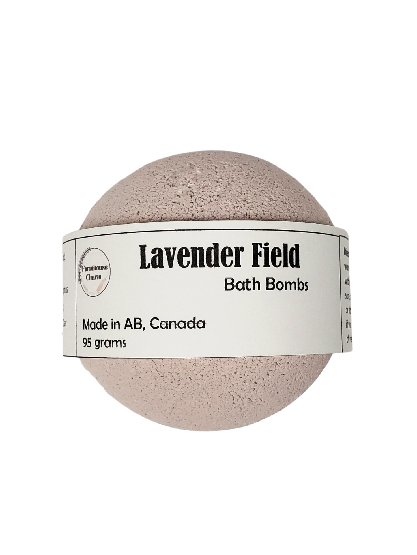Lavender Field Bath Bomb- Farmhouse Charm is made with all natural ingredients and infused with essential oils. Drop or hold in bath water. Enjoy the fizzing action, wonderful aromas and nourishing oils.