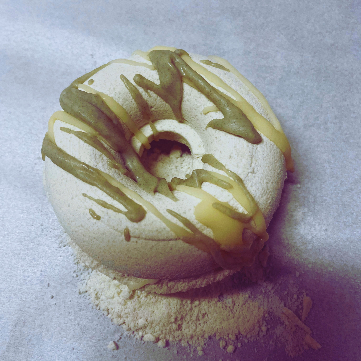 Eucalyptus Mint Donut Bath Bomb- Farmhouse Charm is made with plant-based ingredients and infused only with essential oils. This bath bomb uses Kaolin clay for color and contains moisturizing ingredients such as coconut oil, cocoa butter, and colloidal oatmeal. It does not contain any artificial colorants and fragrance. To Use: Drop or hold in bath water. Enjoy the fizzing action, wonderful aromas and nourishing oils.