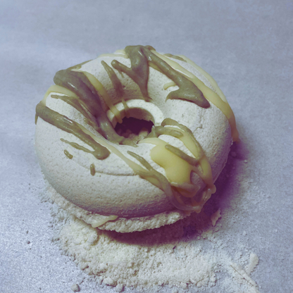Eucalyptus Mint Donut Bath Bomb- Farmhouse Charm is made with plant-based ingredients and infused only with essential oils. This bath bomb uses Kaolin clay for color and contains moisturizing ingredients such as coconut oil, cocoa butter, and colloidal oatmeal. It does not contain any artificial colorants and fragrance. To Use: Drop or hold in bath water. Enjoy the fizzing action, wonderful aromas and nourishing oils.
