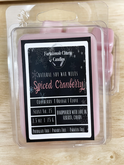 Experience the Festive Season with Spiced Cranberry Soy Wax Melts.  Our Spiced Cranberry Soy Wax Melts embodies the true essence of the holiday spirit. The sweet and inviting aroma will fill any room with warmth and comfort. The tart cranberry and mulberry notes provide a refreshing and fruity scent, complemented by the tangy orange that adds a zesty twist. The combination of spicy clove and warm cinnamon creates a cozy ambiance, perfect for chilly winter nights.www.farmhousecharmcandles.com