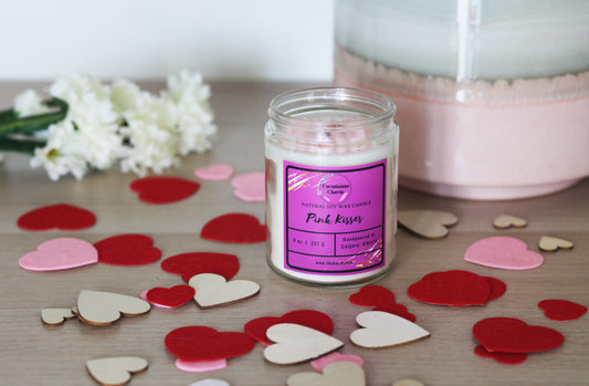 Let this candle fill your home with bright citrus and fruity aroma! Pink Kisses- Farmhouse Charm Natural Soy Candle is blended with sweet floral bouquet and fresh greens with a hint of coconut and spicy vanilla. A sweet and sultry candle for Valentines Day.  size: 8 oz (227 g)  Pink Kisses- Farmhouse Charm Natural Soy Candle is made with 100% natural soy wax. It is biodegradable and from a sustainable source. This candle is paraben free and phthalate free.